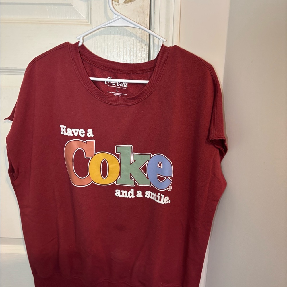 Coca Cola Red and Orange Sweatshirt Vibrant Graphic Design